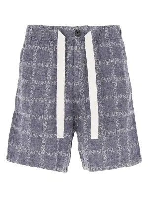 JW Anderson All-Over Logo Print Wide Leg Shorts